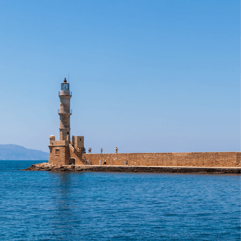 Take a trip along the coast road and visit Chania city, where historic sights await