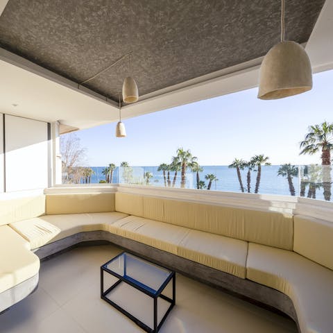 Enjoy ice-cold drinks with waterfront views as you gather on the balcony