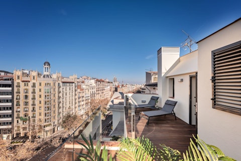 Stretch out above Barcelona's rooftops with the Sagrada Família in sight