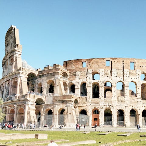Stroll fifteen minutes to the iconic facade of the Colosseum