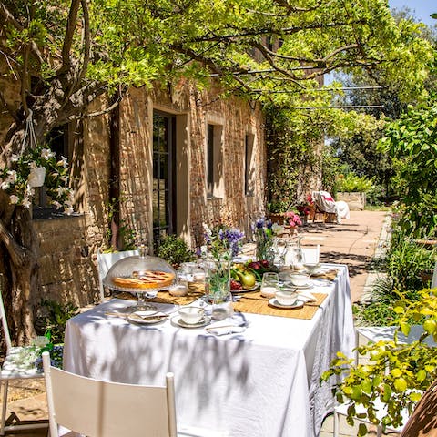 Host a group meal with large servings of Panzanella, to enjoy under the gazebo