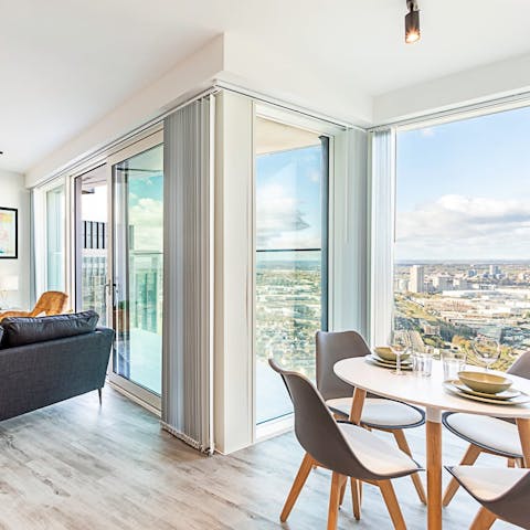 Dine inside or out on the balcony while taking in incredible views of London
