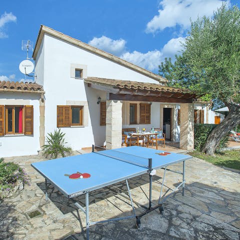 Challenge your partner to a ping pong match out on this sun-soaked terrace