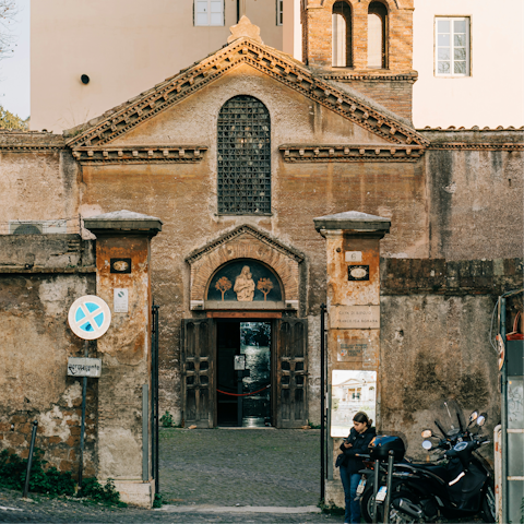Explore picturesque piazzas and basilicas in Trastevere