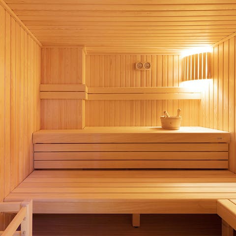 Unwind with a relaxing session in the communal sauna