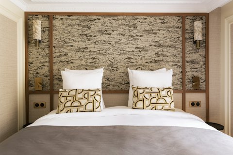 Recharge in a serene bedroom after sightseeing across Paris
