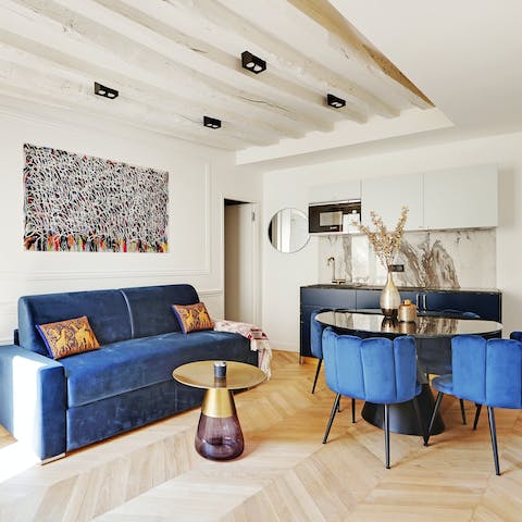 Kick back on the sofa with a glass of French wine or gather around the table for a chic soirée