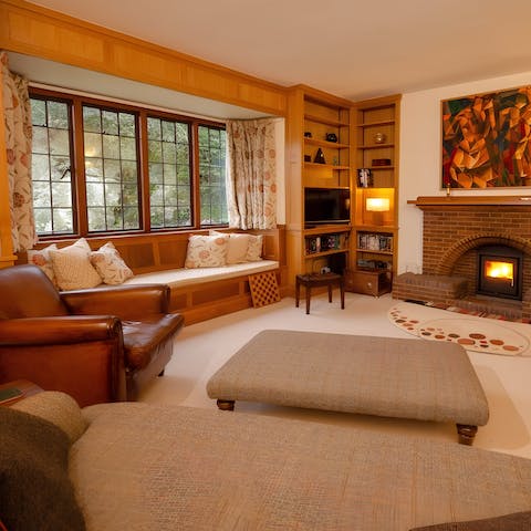 Hunker down in the cosy living room after a long walk through the countryside