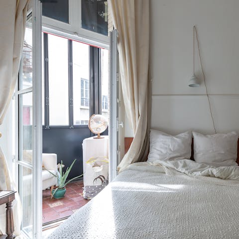 Tuck yourself away in the second bedroom's sunny reading nook