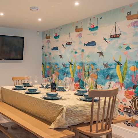 Gather round the bench picnic-like dining table for a relaxed dinner