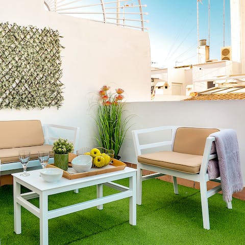 Make your way up to the terrace for sunset drinks and tapas