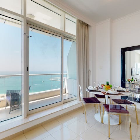 Discuss the city tours available over a sea-facing Middle Eastern breakfast