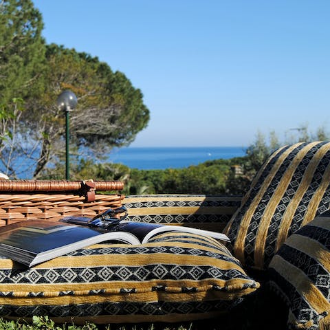 Relax with a holiday read in the tranquil setting of the home's garden