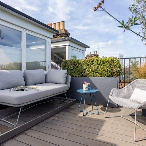 Enjoy a glass of Champagne on the private roof terrace