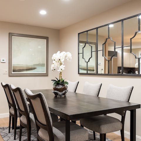Dine in style by the dark wooden dining table