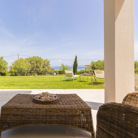 Catch glimpses of the Aegean Sea as you sip your morning coffee