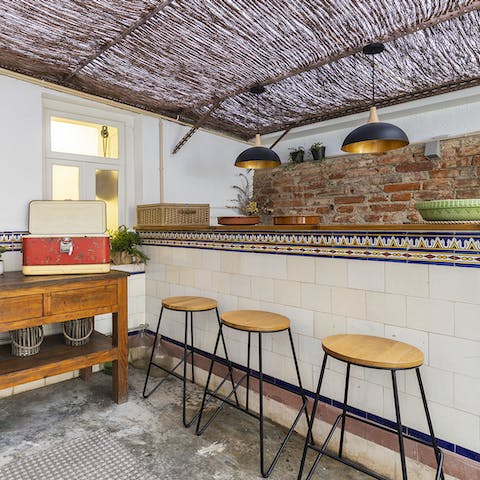 Mix your favourite cocktails at the outdoor bar