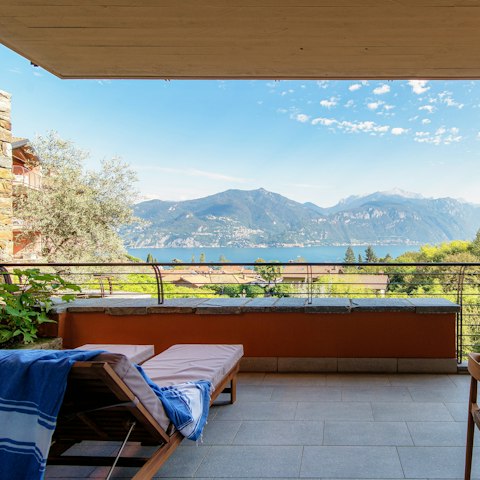 End the day with sunset drinks on the private balcony