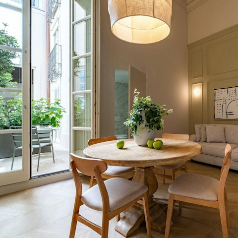 Enjoy a morning espresso overlooking the patio garden
