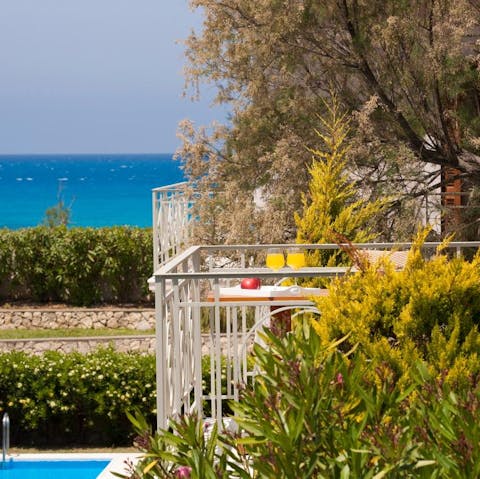 Start your day with a fresh Greek coffee on the balcony with sea views