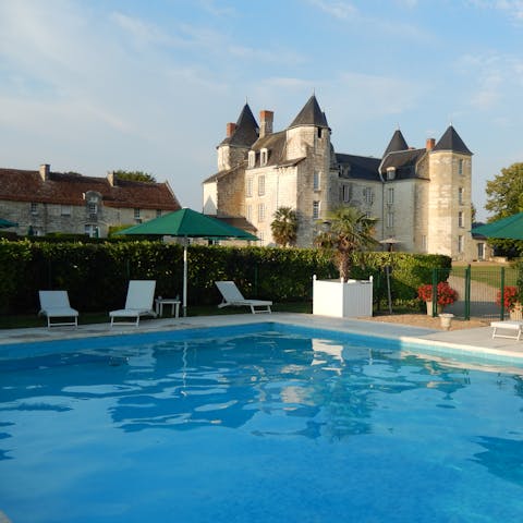 Swim in the private pool as the sun warms your skin