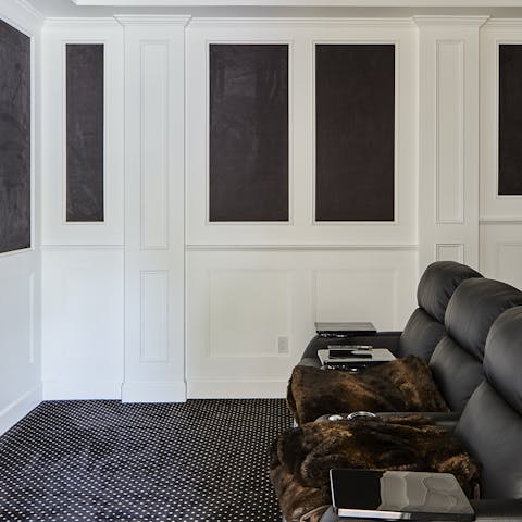 Watch a blockbuster in the home cinema room
