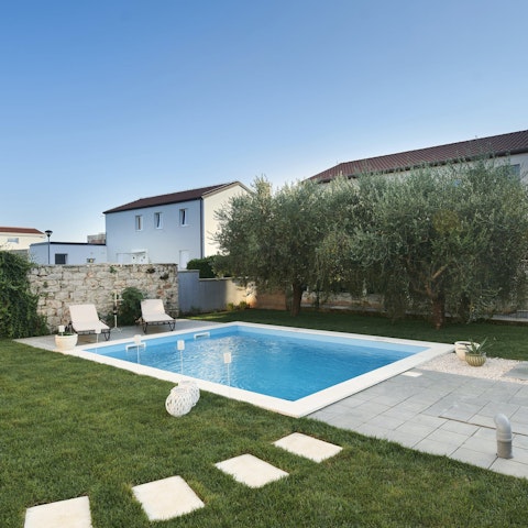 Spend serene days stretched out by the pool