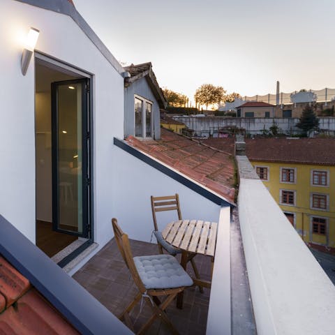 Enjoy a sundowner on the private balcony after a day of exploring
