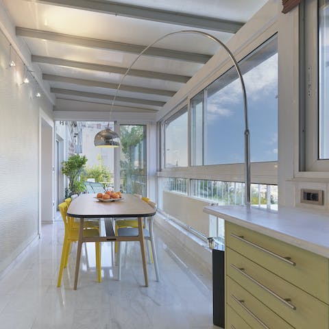 Share Greek feasts in your light-filled dining room