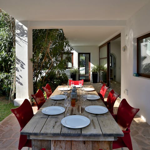 Tuck into a paella at the alfresco dining table