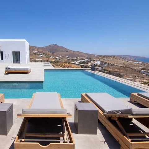 Catch some rays on loungers or swim lengths in the private infinity pool