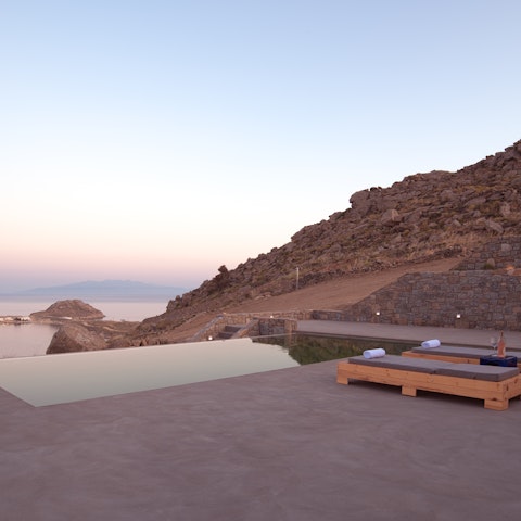 Watch the sun go down over the Aegean from the spacious patio area