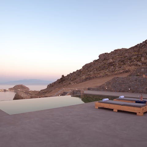 Watch the sun go down over the Aegean from the spacious patio area