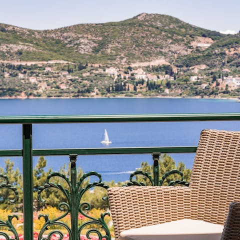 Watch the boats sail by from your top-floor balcony