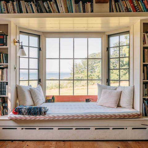 Make yourself comfortable in the bay window with its stunning sea views