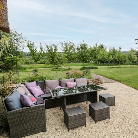 Sip Champagne in the garden before soaking in the hot tub
