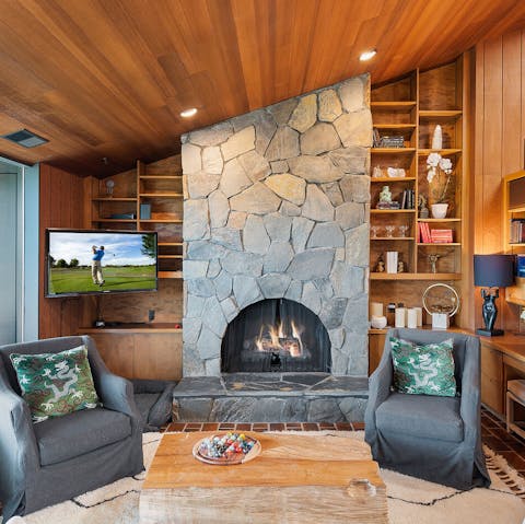 Grab a book and make yourself comfortable in front of the fireplace