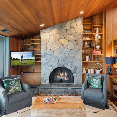 Grab a book and make yourself comfortable in front of the fireplace