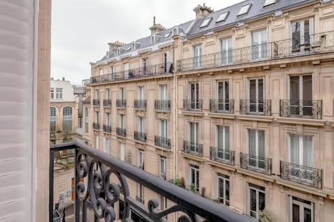 Admire the Hausmann architecture from the Juliet balcony