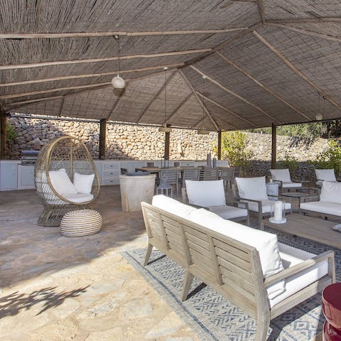 Chill out on the outside sofas or hanging chair