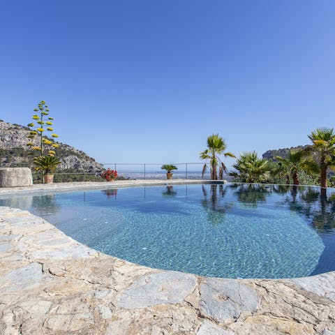 Step into the large private pool first thing in the morning