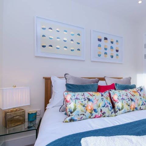 Draw the black-out blinds in the king-size bedroom when it's time to bank some beauty sleep