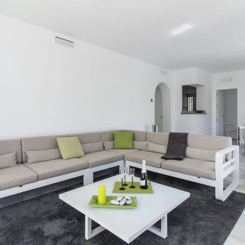 Curl up on the large sofa, perfect for movie nights and afternoon naps