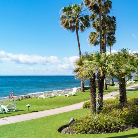 Nip across the street to stroll along Alcazaba Beach