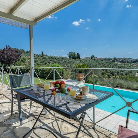 Eat breakfast alfresco to enjoy the views of the rolling Tuscan hills