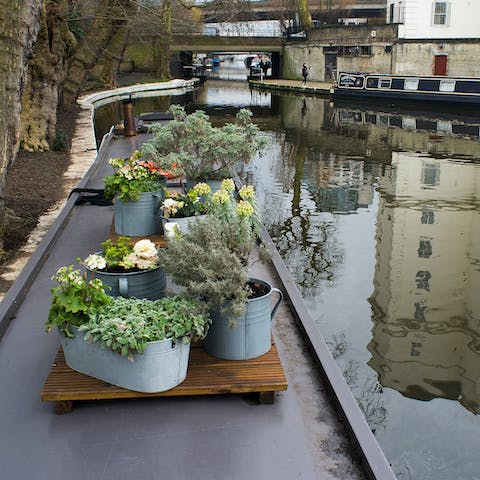 Sit out on the top deck and watch fellow boats cruise by