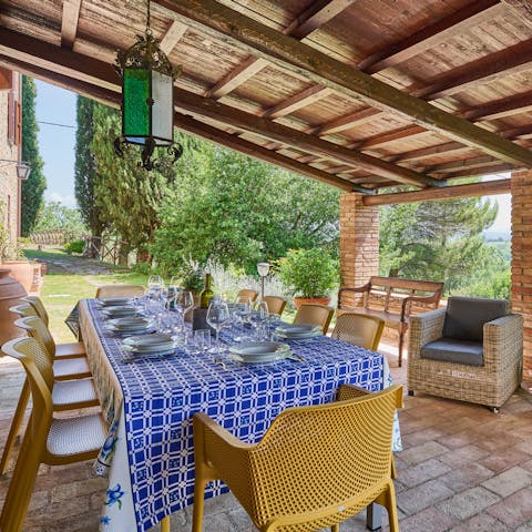 Dine alfresco under the welcome shade of the pergola