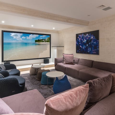 Curl up on the comfy sofas and screen a classic movie in the cinema room