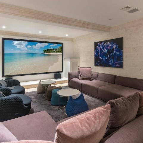 Curl up on the comfy sofas and screen a classic movie in the cinema room