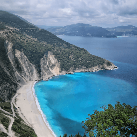 Explore striking coasts like Antisamos Beach, thirteen minutes away by car